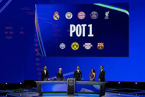 2024-25 UEFA Champions League Draw: Gianluigi Buffon, UEFA's Giorgio Marchetti and Cristiano Ronaldo in Monaco